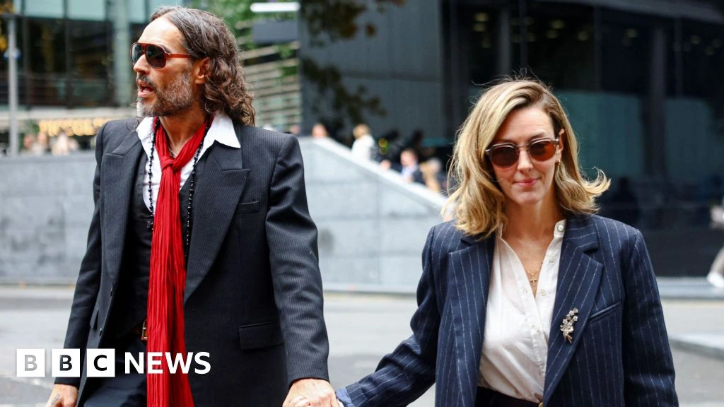 Russell Brand's wife tells his rape trial he is 'kind and a wonderful father'